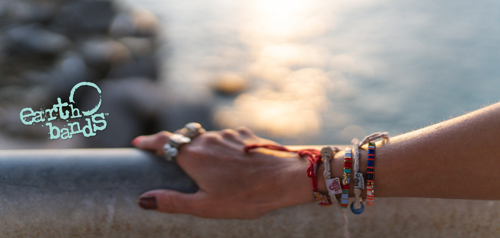 Earth Bands lifestyle photo — wearing the bracelet at sunset